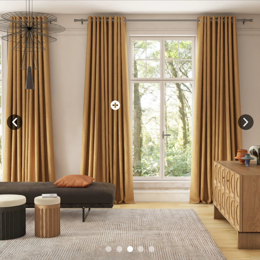 Neutral floor-length curtains in a contemporary contract interior
