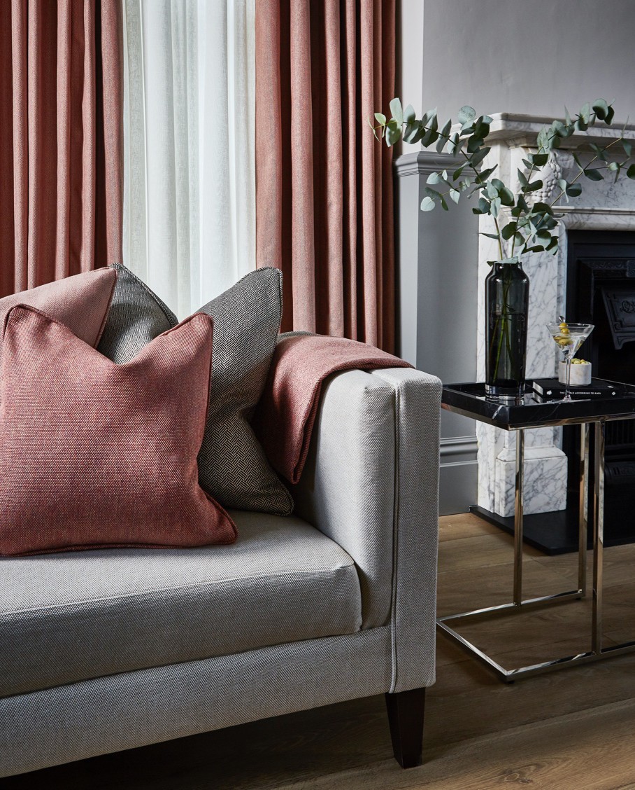 Close detail of coordinated curtains, cushions and upholstery